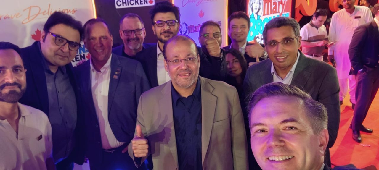 The Mary Brown’s and Prime F&B teams, with Senior Trade Commissioner Daniel Arsenault (bottom right) during the Lahore grand opening.